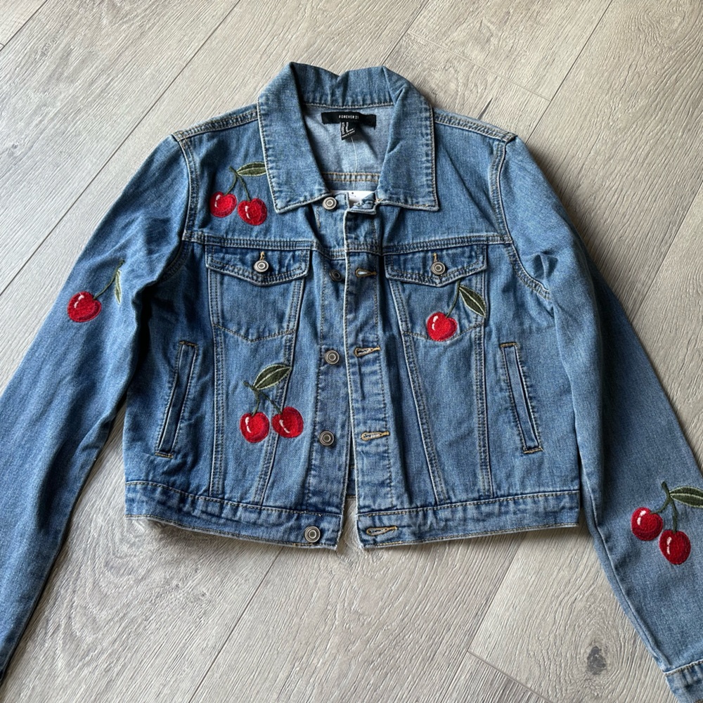 Denim jacket with cherries. Size medium.